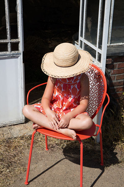Lorette Armchair by Fermob, showing lorette armchair in live shot.
