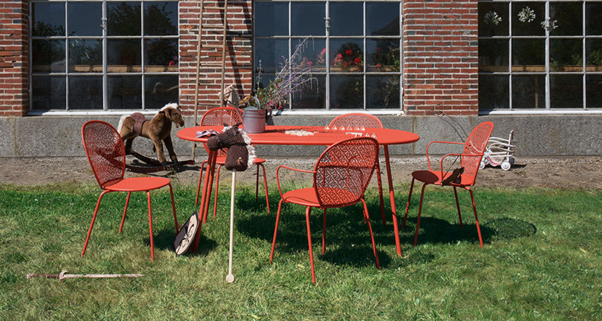 Lorette Armchair by Fermob, showing lorette armchair in live shot.