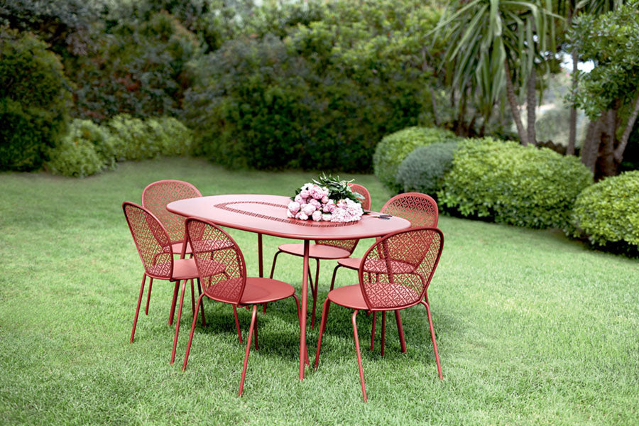 Lorette Oval Table by Fermob, showing lorette oval table in live shot.