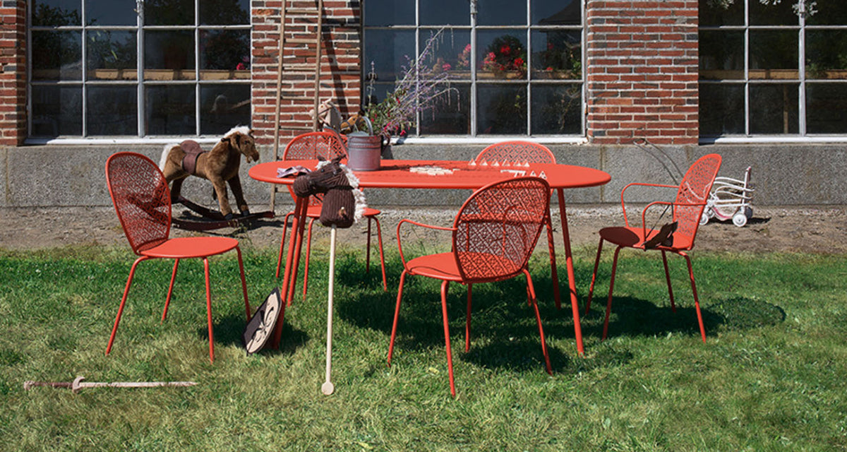 Lorette Oval Table by Fermob, showing lorette oval table in live shot.