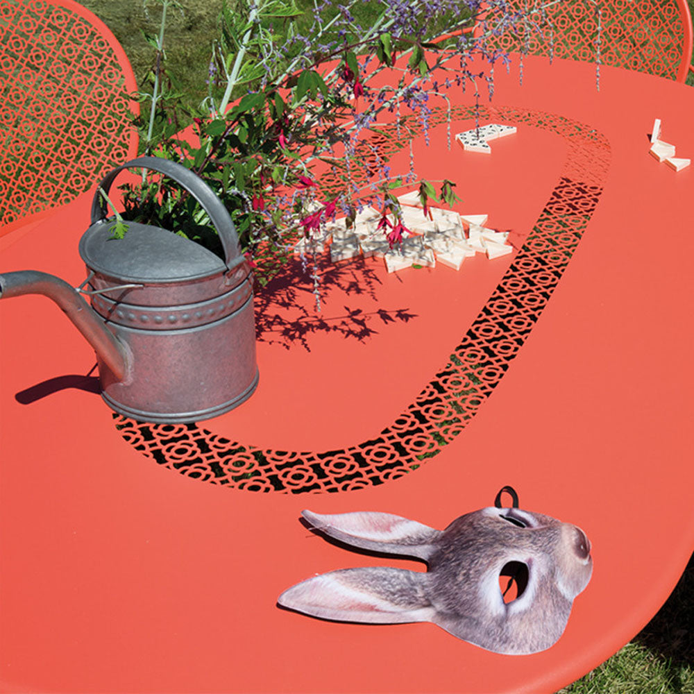 Lorette Oval Table by Fermob, showing closeup view of lorette oval table in live shot.