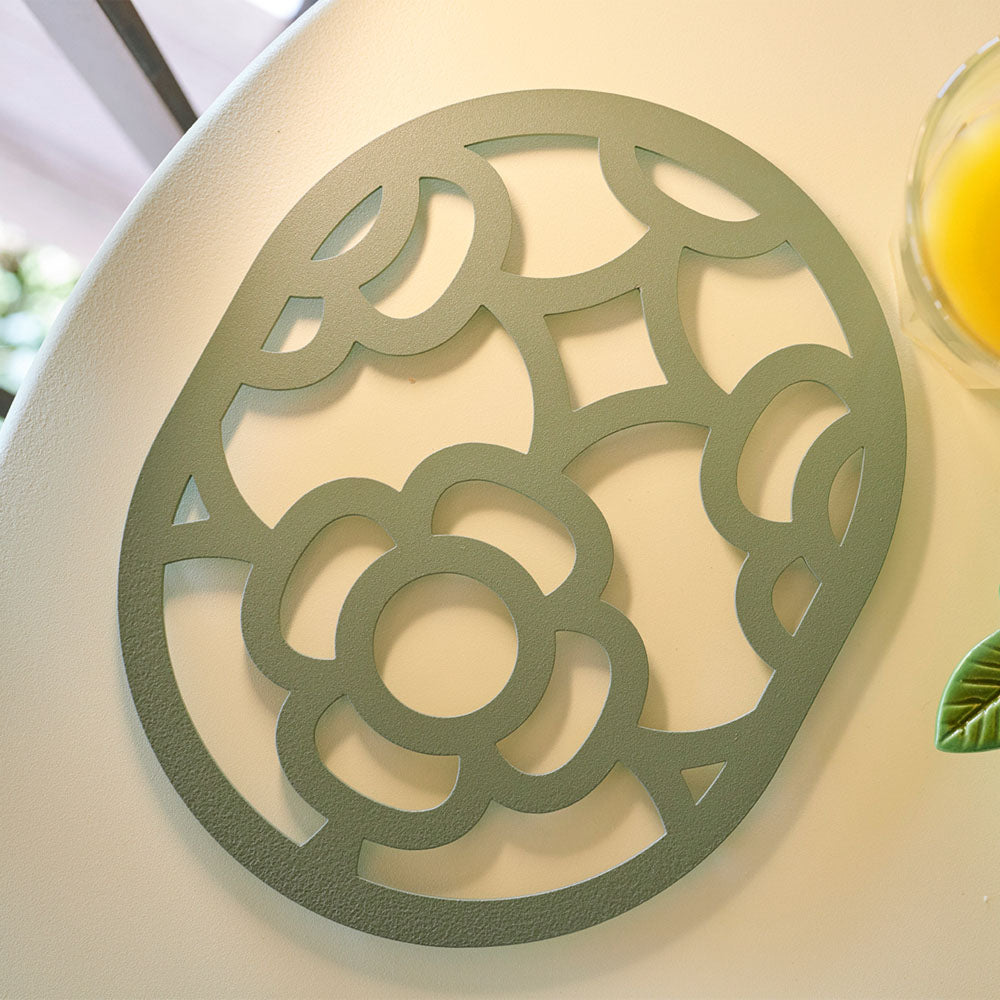 Lorette Trivet by Fermob, showing lorette trivet in live shot.