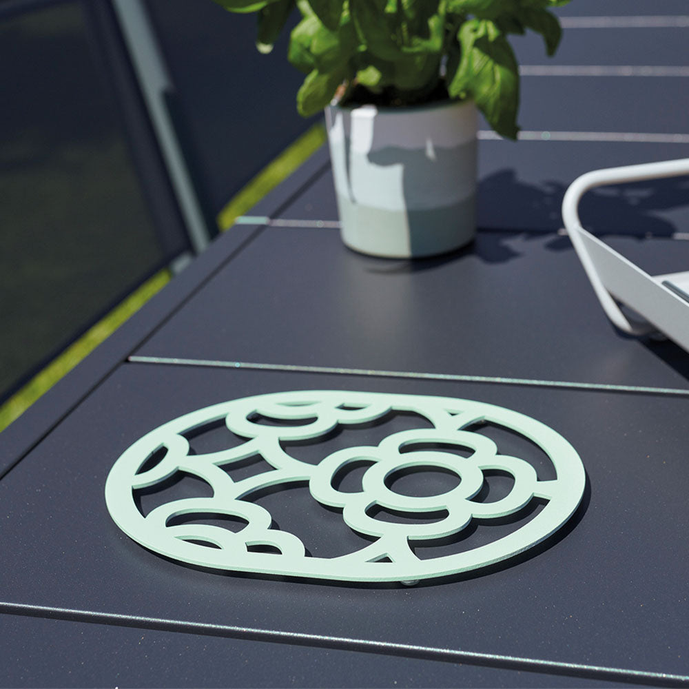 Lorette Trivet by Fermob, showing lorette trivet in live shot.