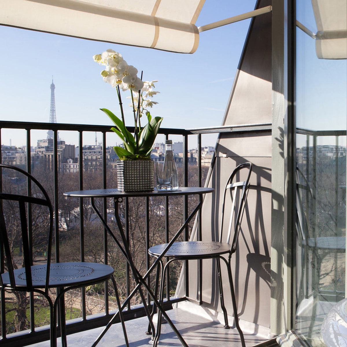 Louvre Side Chair by Fermob, showing louvre side chair in live shot.
