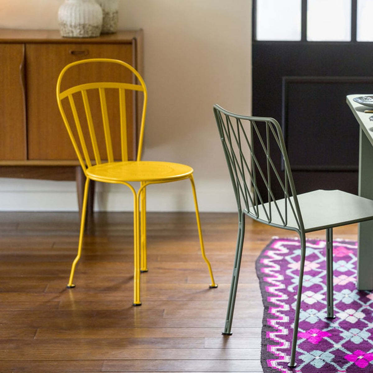 Louvre Side Chair by Fermob, showing louvre side chair in live shot.