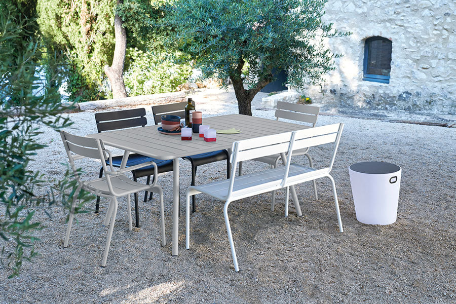Luxembourg Stacking Side Chair by Fermob, showing side chairs with tables in live shot.