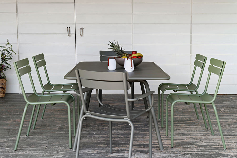 Luxembourg Stacking Side Chair by Fermob, showing side chairs with tables in live shot.