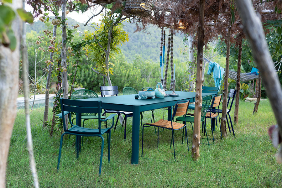 Luxembourg Stacking Side Chair by Fermob, showing side chairs with tables in live shot.