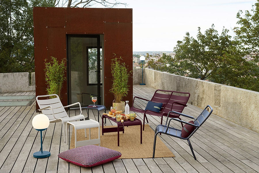 Luxembourg Steel Low Armchair by Fermob, showing luxembourg steel low armchair in live shot.