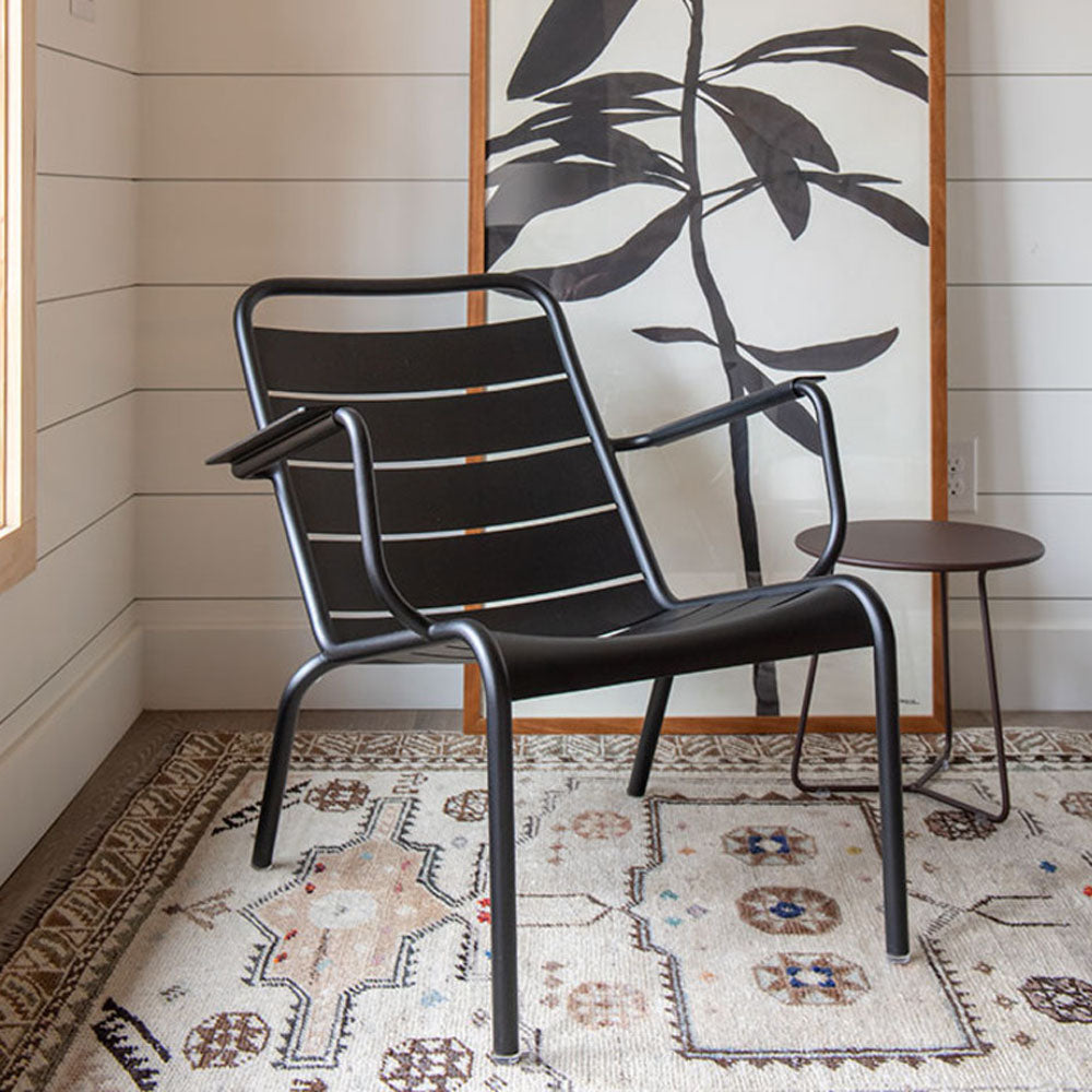 Luxembourg Steel Low Armchair by Fermob, showing luxembourg steel low armchair in live shot.