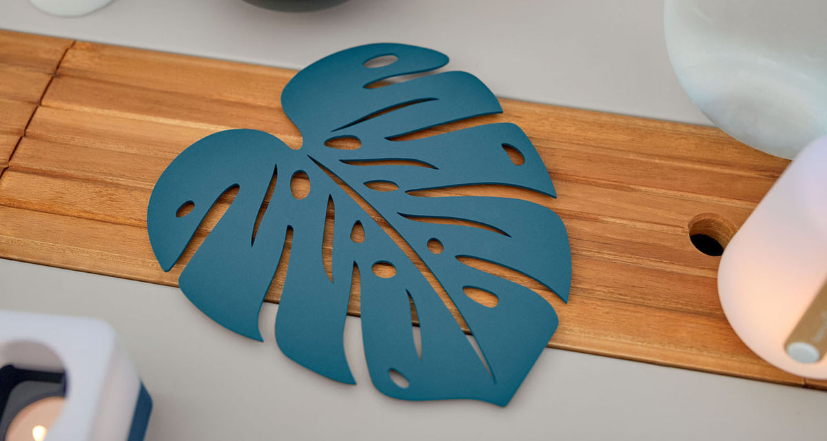 Monstera Trivet by Fermob, showing monstera trivet in live shot.
