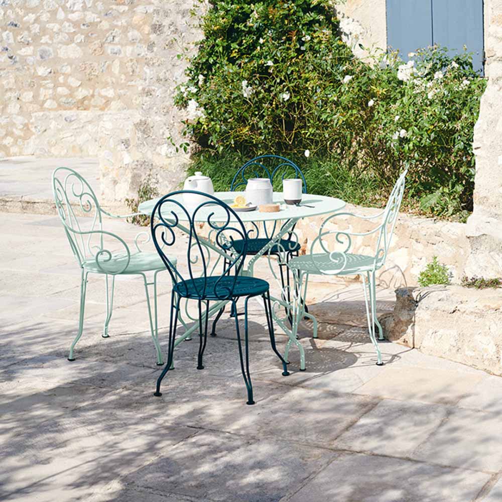 Montmartre Armchair by Fermob, showing montmartre armchair in live shot.