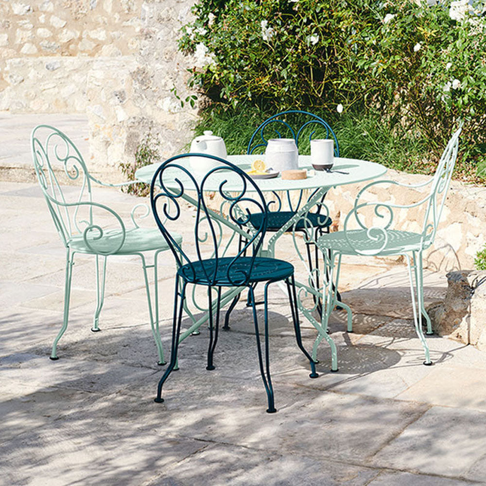 Montmartre Perforated Tables by Fermob, showing montmartre perforated tables in live shot.