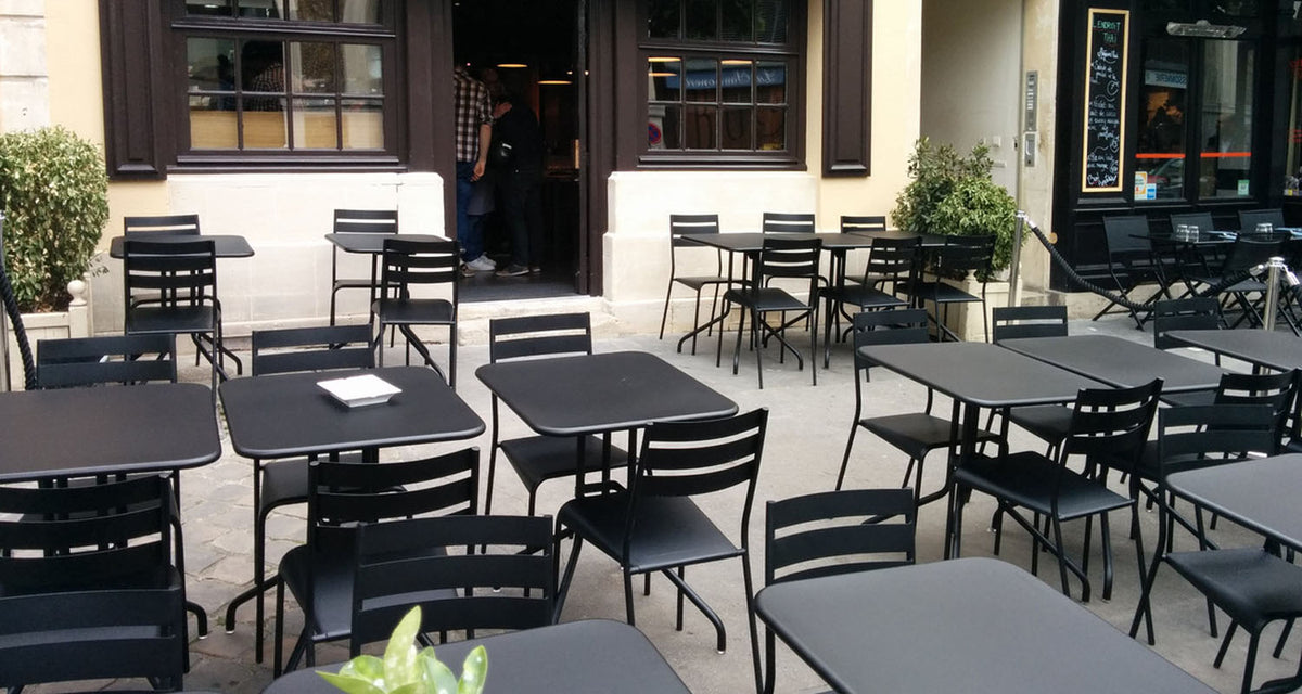 Petale Folding Table by Fermob, showing petale folding table in live shot.