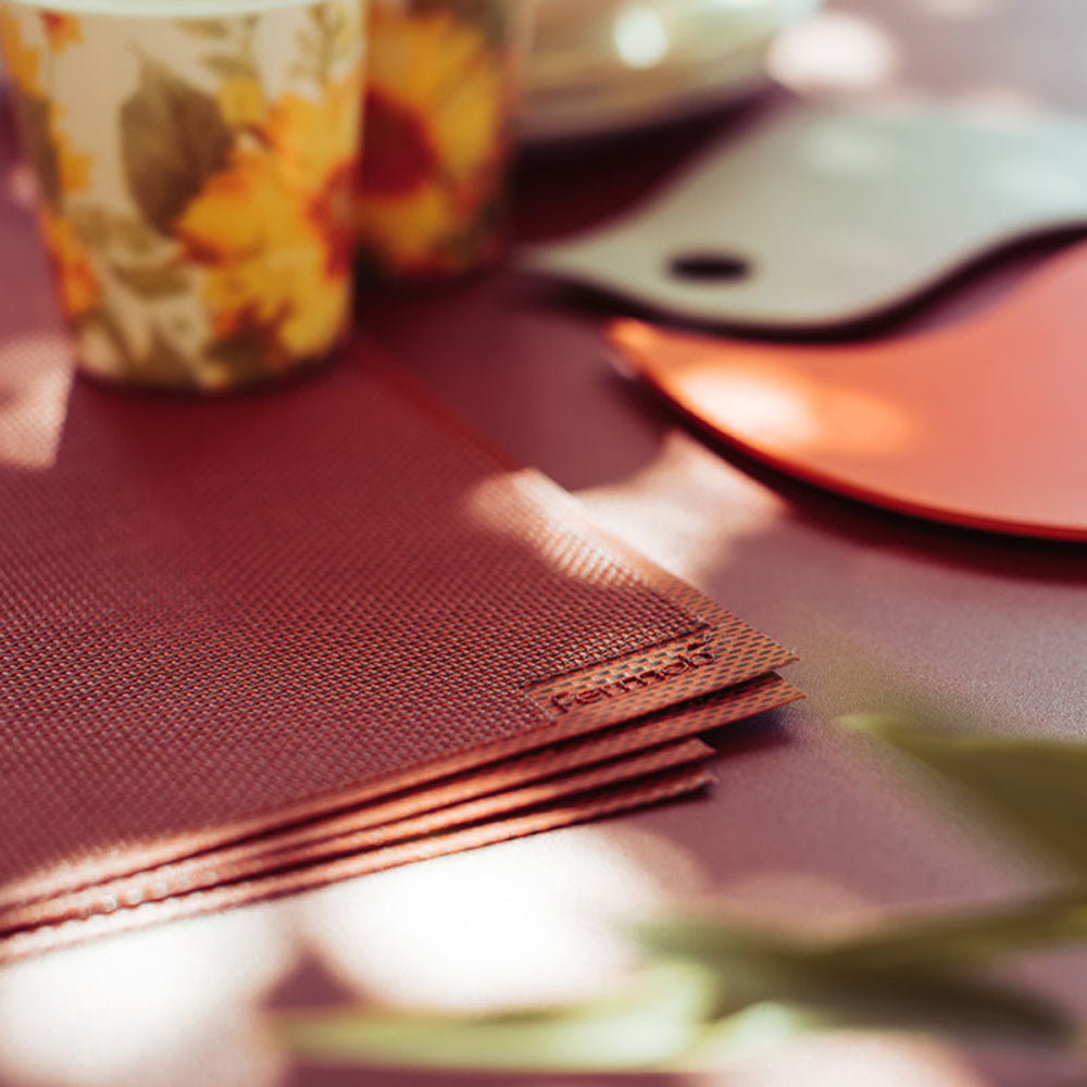 Placemat 13" x 18" by Fermob, showing closeup view of placemat 13" x 18" in live shot.