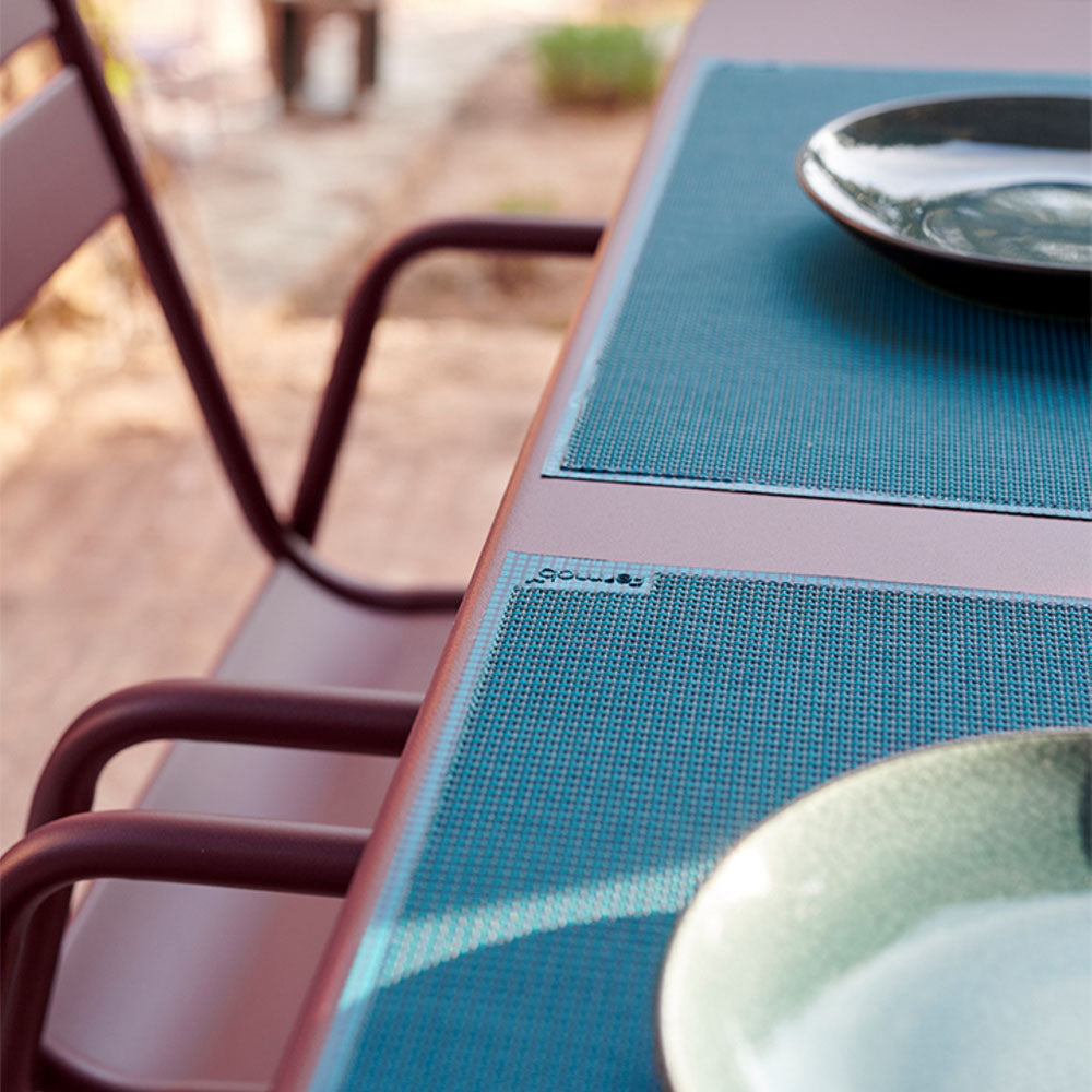 Placemat 13" x 18" by Fermob, showing closeup view of placemat 13" x 18" in live shot.