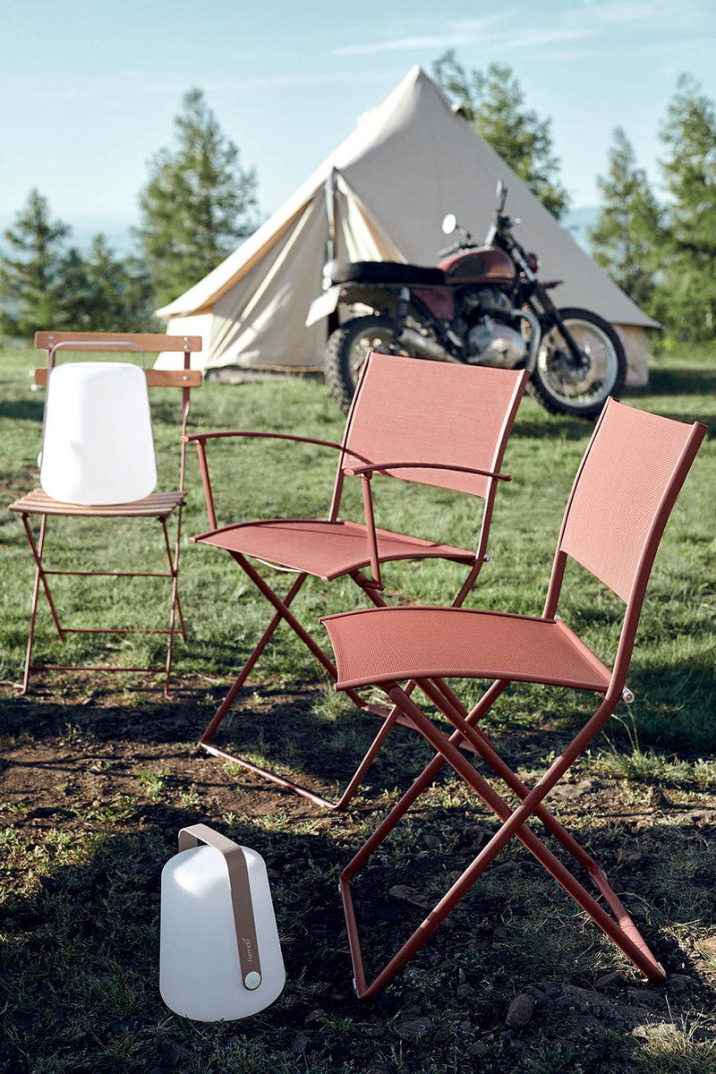 Plein Air Armchair by Fermob, showing plein air armchair in live shot.