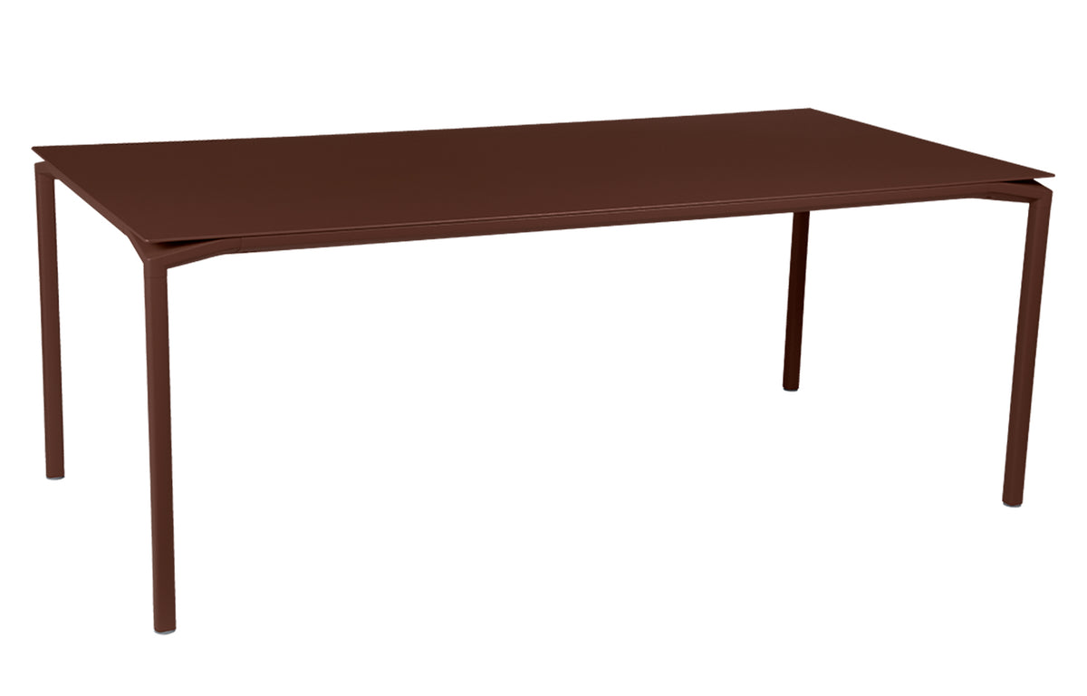 Calvi Dining Table by Fermob - Russet (speckled matte textured).