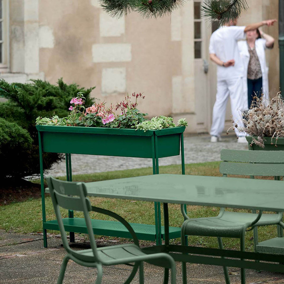 Terrazza Planter by Fermob, showing terrazza planter in live shot.