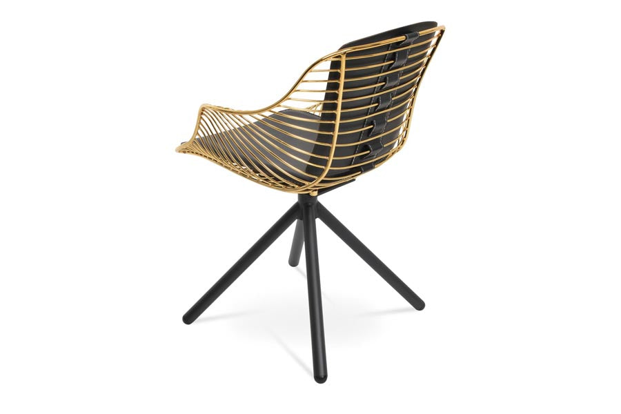 Zebra Stick Swivel Armchair by SohoConcept, showing side view of zebra stick swivel armchair