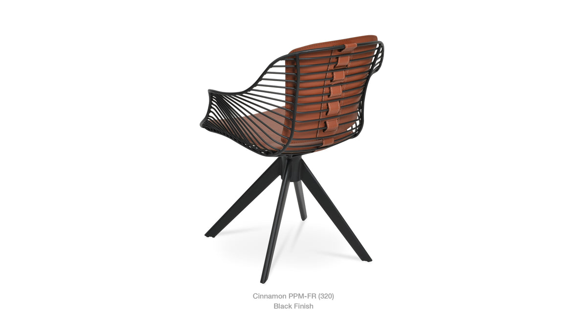 Zebra Sword Swivel Armchair by SohoConcept, showing side view of zebra sword swivel armchair.