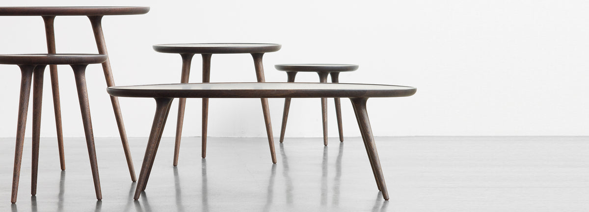 Accent Cafe Table by Mater, showing accent cafe table with different accent tables in live shot.