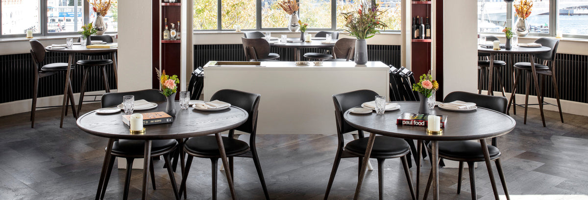 Accent Dining Table by Mater, showing accent dining tables in live shot.