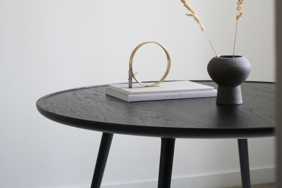 Accent Dining Table by Mater, showing closeup view of accent dining table in live shot.