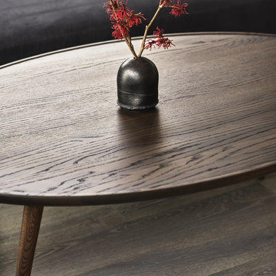 Accent Oval Lounge Table by Mater, showing closeup view of accent oval lounge table in live shot.