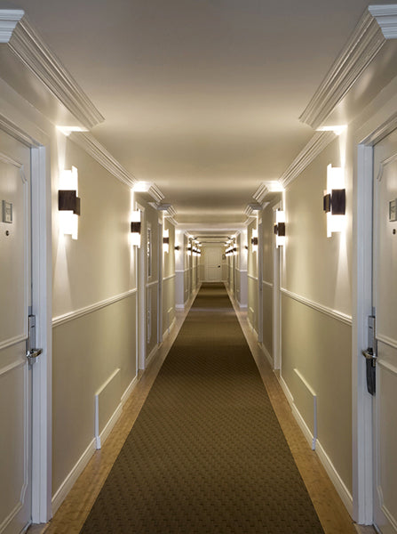 Acuo Sconce by Cerno, showing acuo sconces in live shot.