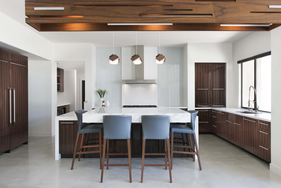 Aeris LED Linear Pendant by Cerno, showing aeris led linear pendant with table & chairs in live shot.