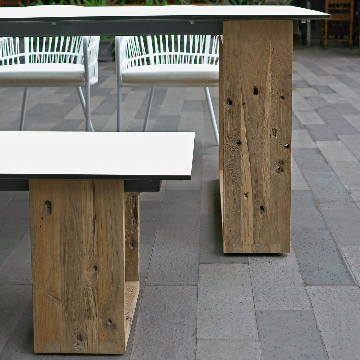 Aiko Bench by Mamagreen, showing closeup view of aiko bench with aiko dining table & chairs in live shot.