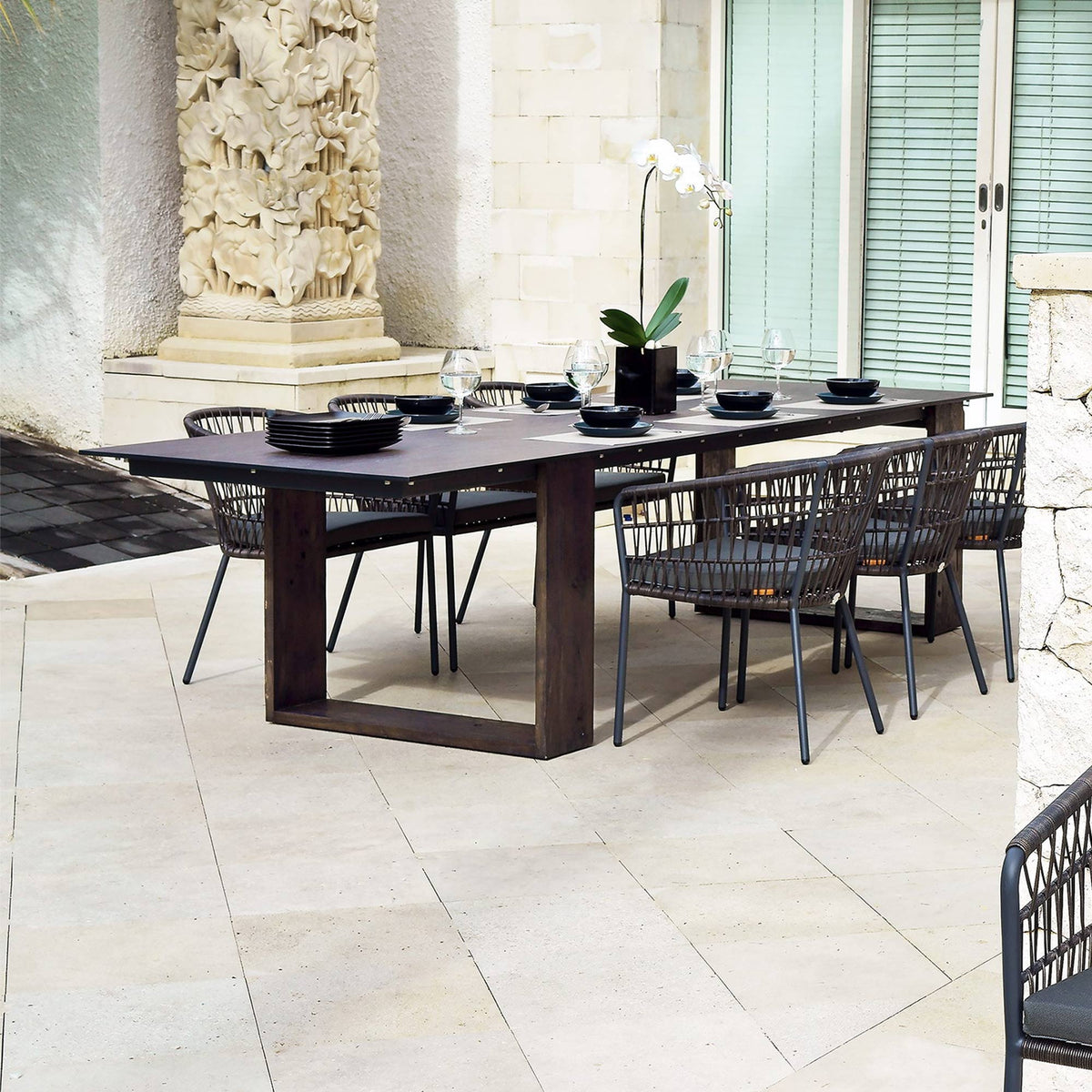 Aiko Dining Table by Mamagreen, showing showing aiko dining table with chairs in live shot.