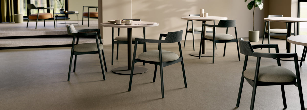 Alek Chair by B&T, showing alek chairs with tables in live shot.