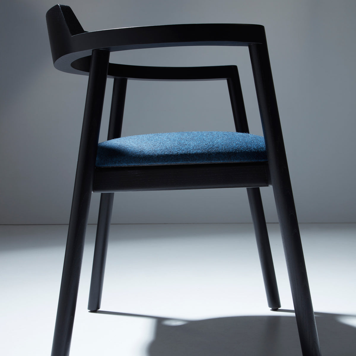 Alek Chair by B&T, showing alek chair in live shot.