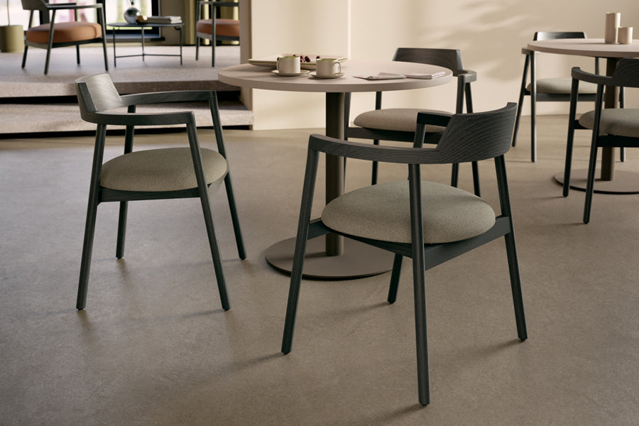 Alek Chair by B&T, showing alek chairs with tables in live shot.