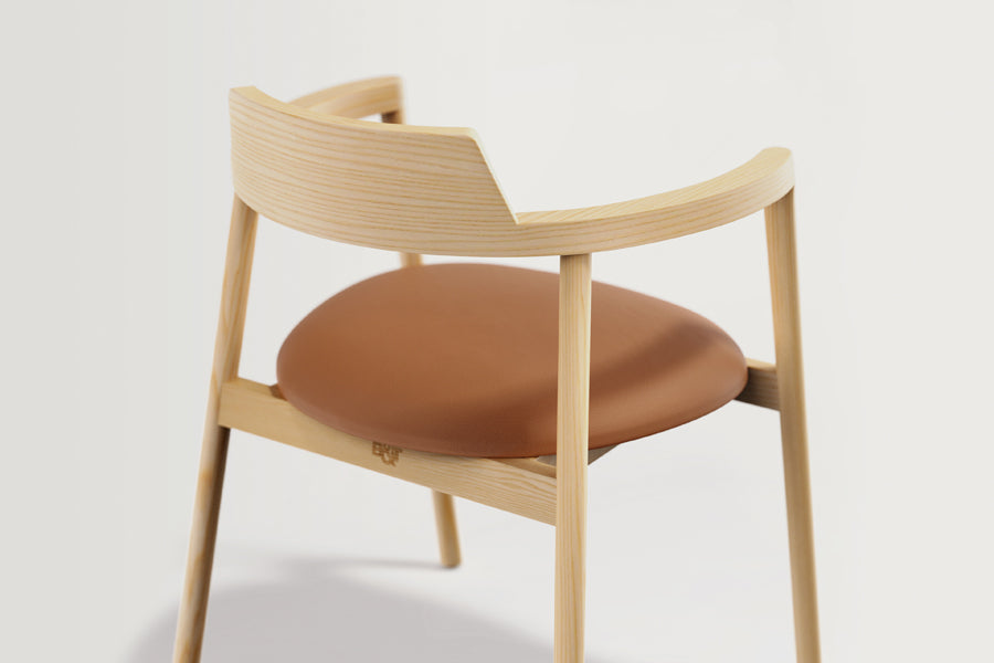 Alek Chair by B&T, showing alek chair in live shot.