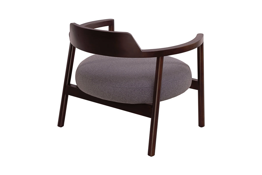 Alek Lounge Chair by B&T, showing back view of alek lounge chair in brown nino fabric + walnut wood.