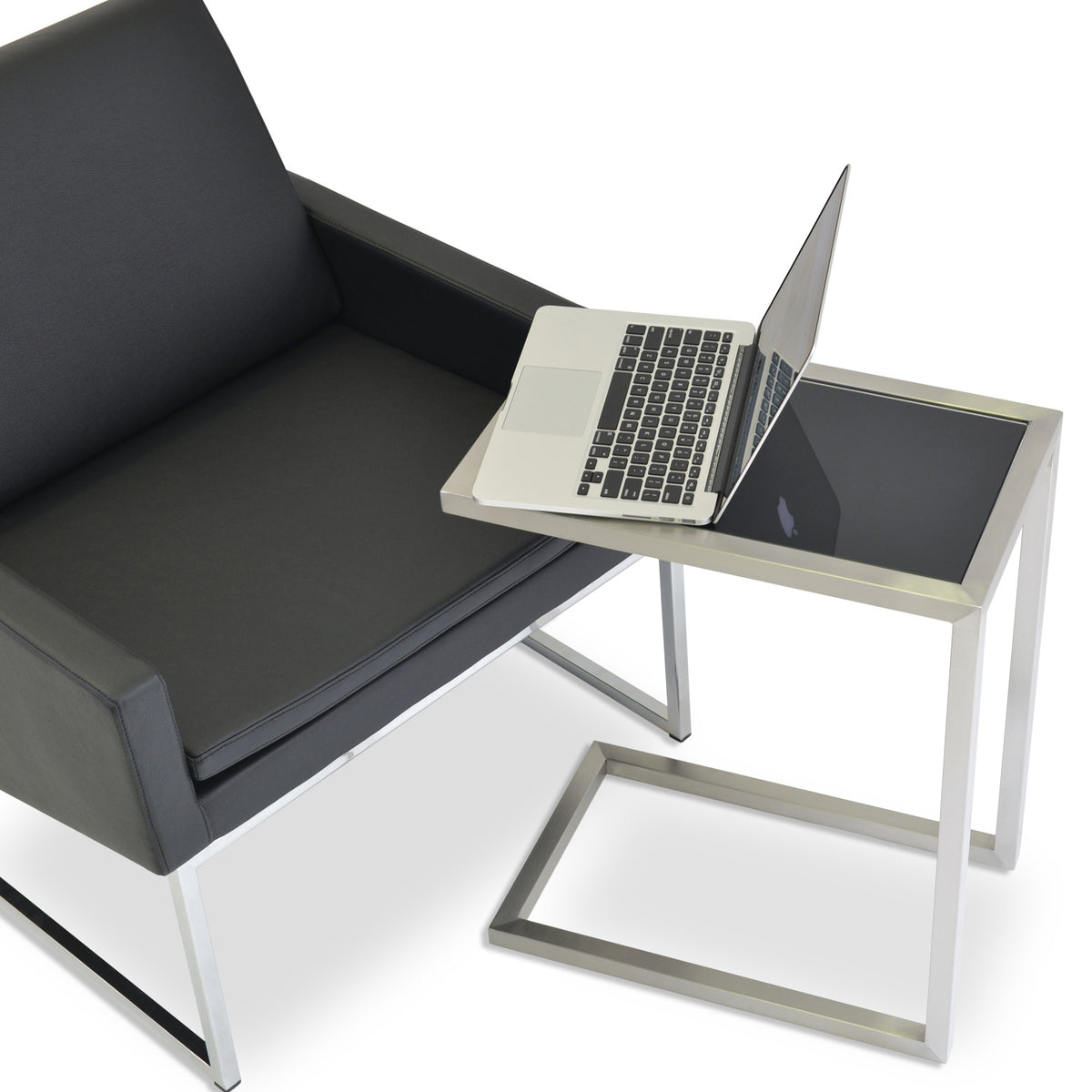 Alfa End Table by sohoConcept, showing end table with chair.