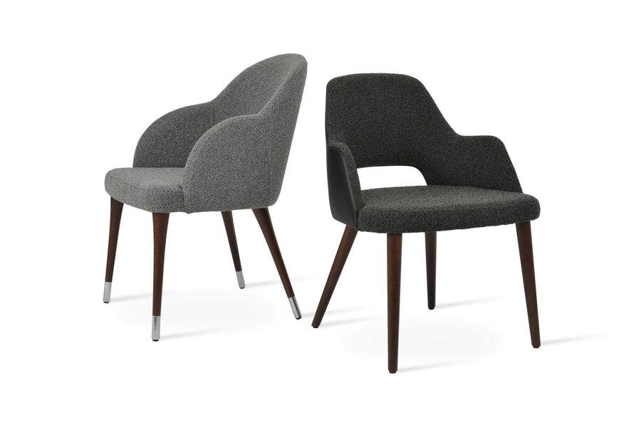 Alice Wood Armchair by SohoConcept, showing side view of alice wood armchair in grey-black boucle fabric with different chair.