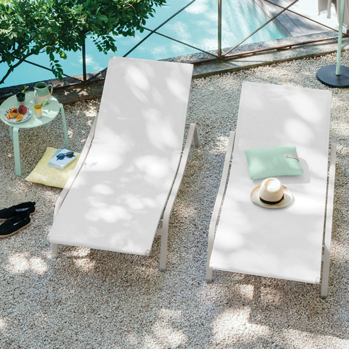 Alize Sunlounger by Fermob, showing alize sunlounger in live shot.