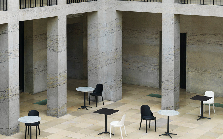 Allez PP Dining Chair by Normann Copenhagen, showing allez pp dining chairs with tables in live shot.