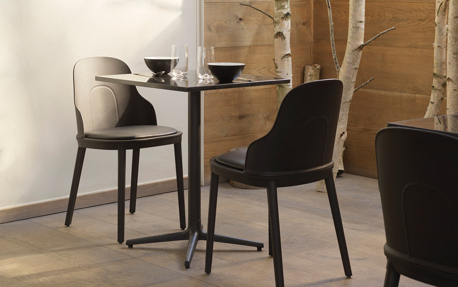 Allez PP Dining Chair by Normann Copenhagen, showing allez pp dining chairs with table in live shot.