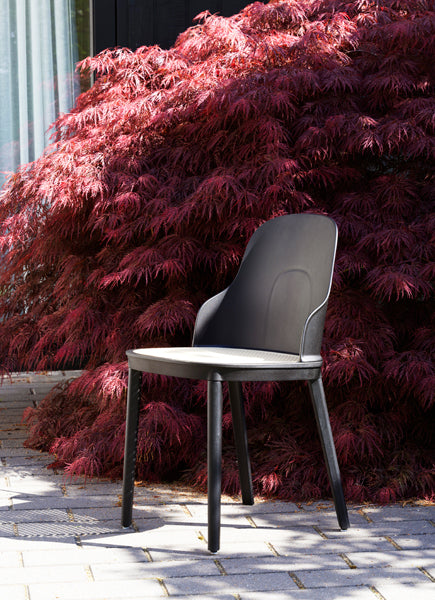 Allez PP Dining Chair Molded Wicker Seat by Normann Copenhagen, showing allez pp dining chair molded wicker seat in live shot.