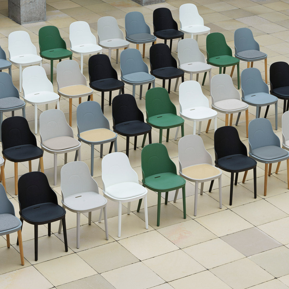 Allez PP Dining Chair Molded Wicker Seat/Oak Legs by Normann Copenhagen, showing allez pp dining chair molded wicker seat in live shot.