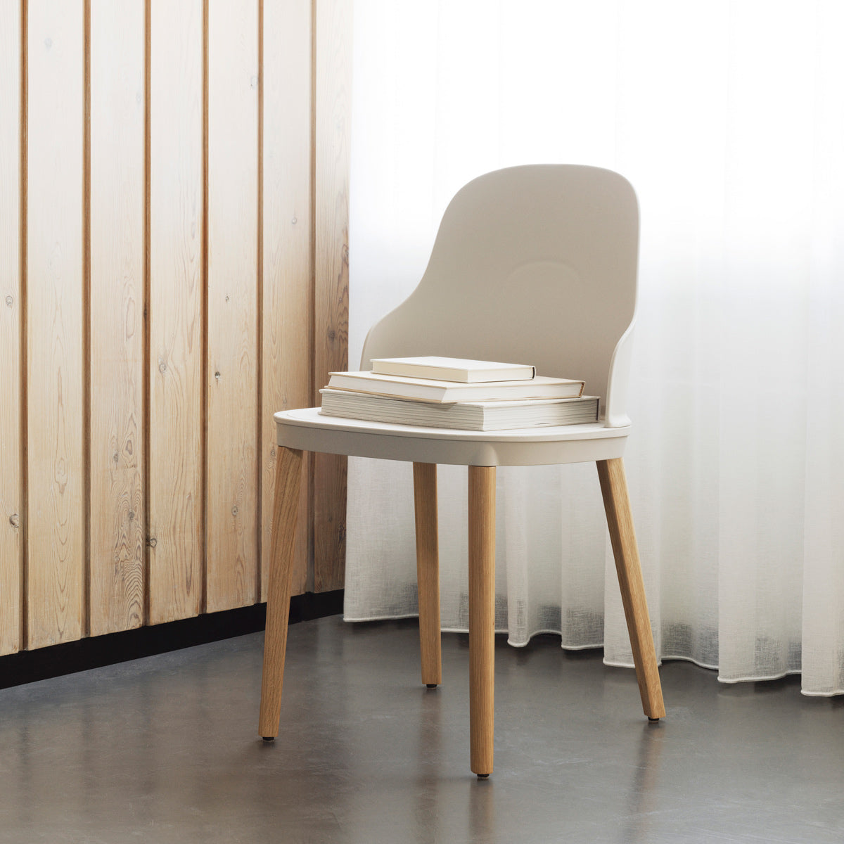 Allez PP Dining Chair Oak Legs by Normann Copenhagen, showing allez pp dining chair oak legs in live shot.
