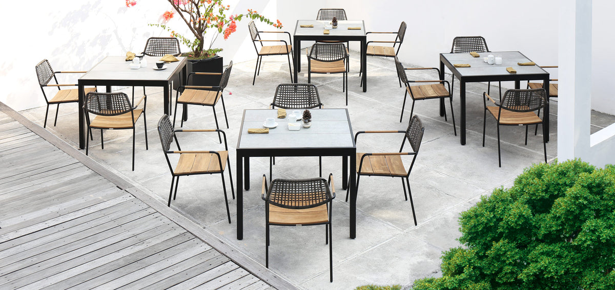 Allux 39.5" HPL Dining Table by Mamagreen, showing allux 39.5" hpl dining tables with chairs in live shot.