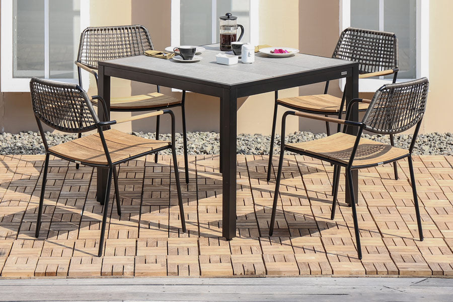 Allux 39.5" HPL Dining Table by Mamagreen, showing allux 39.5" hpl dining table with chairs in live shot.