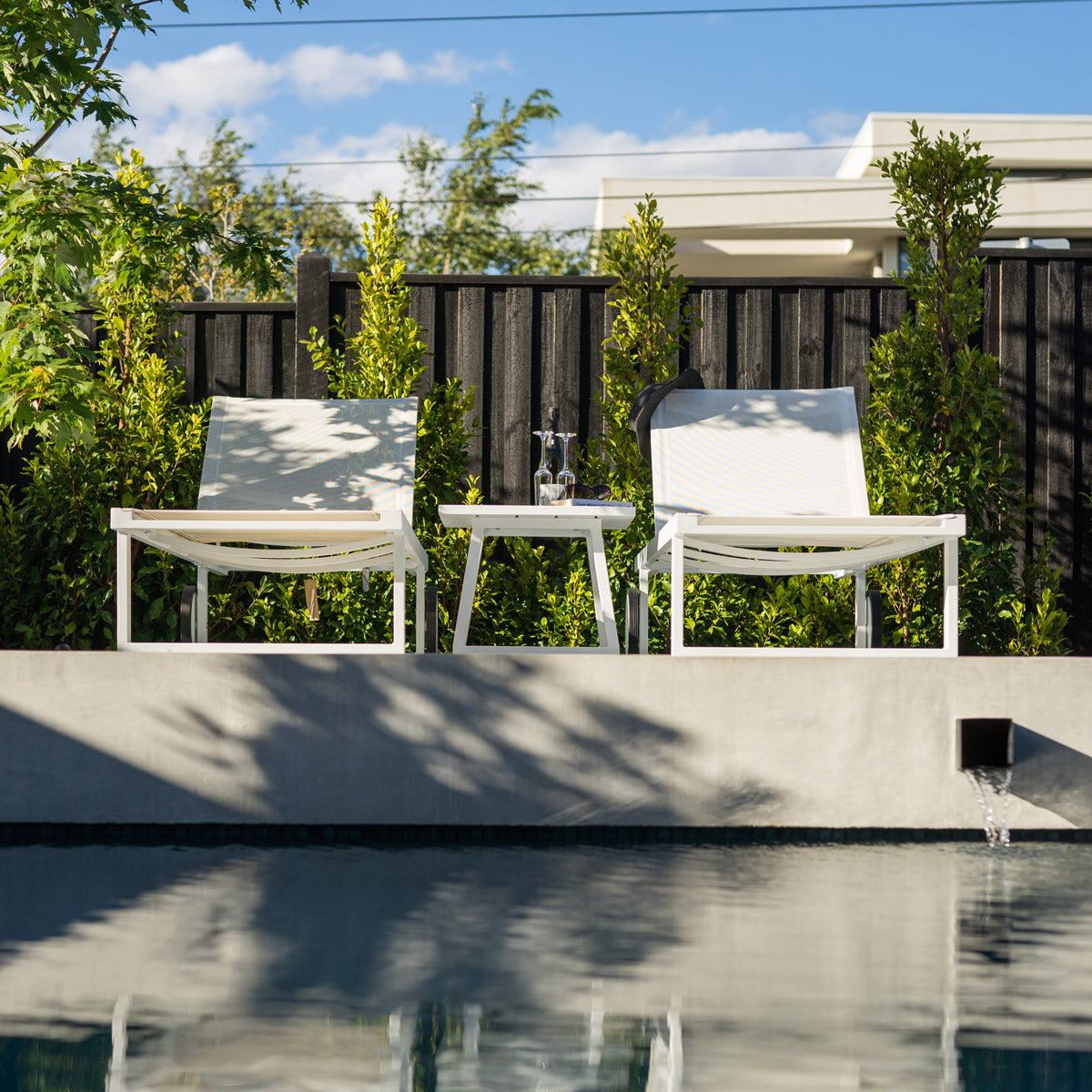 Allux Stackable Ledge Lounger by Mamagreen, showing allux stackable ledge loungers in live shot.