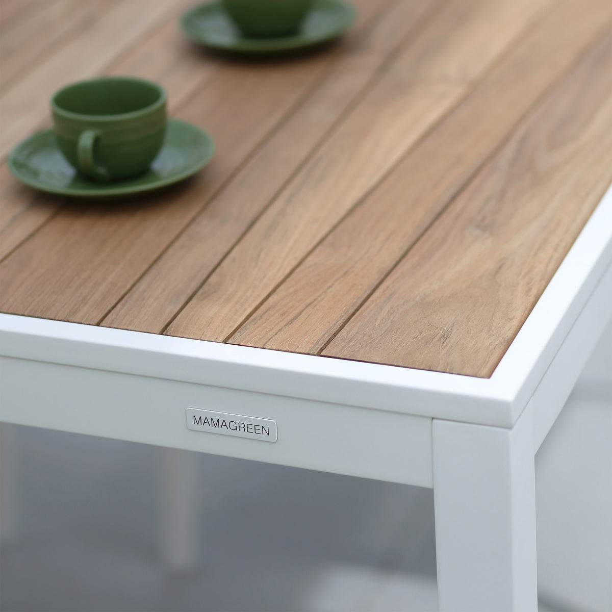 Allux Wood Dining Table by Mamagreen, showing closeup view of allux wood dining table in live shot.